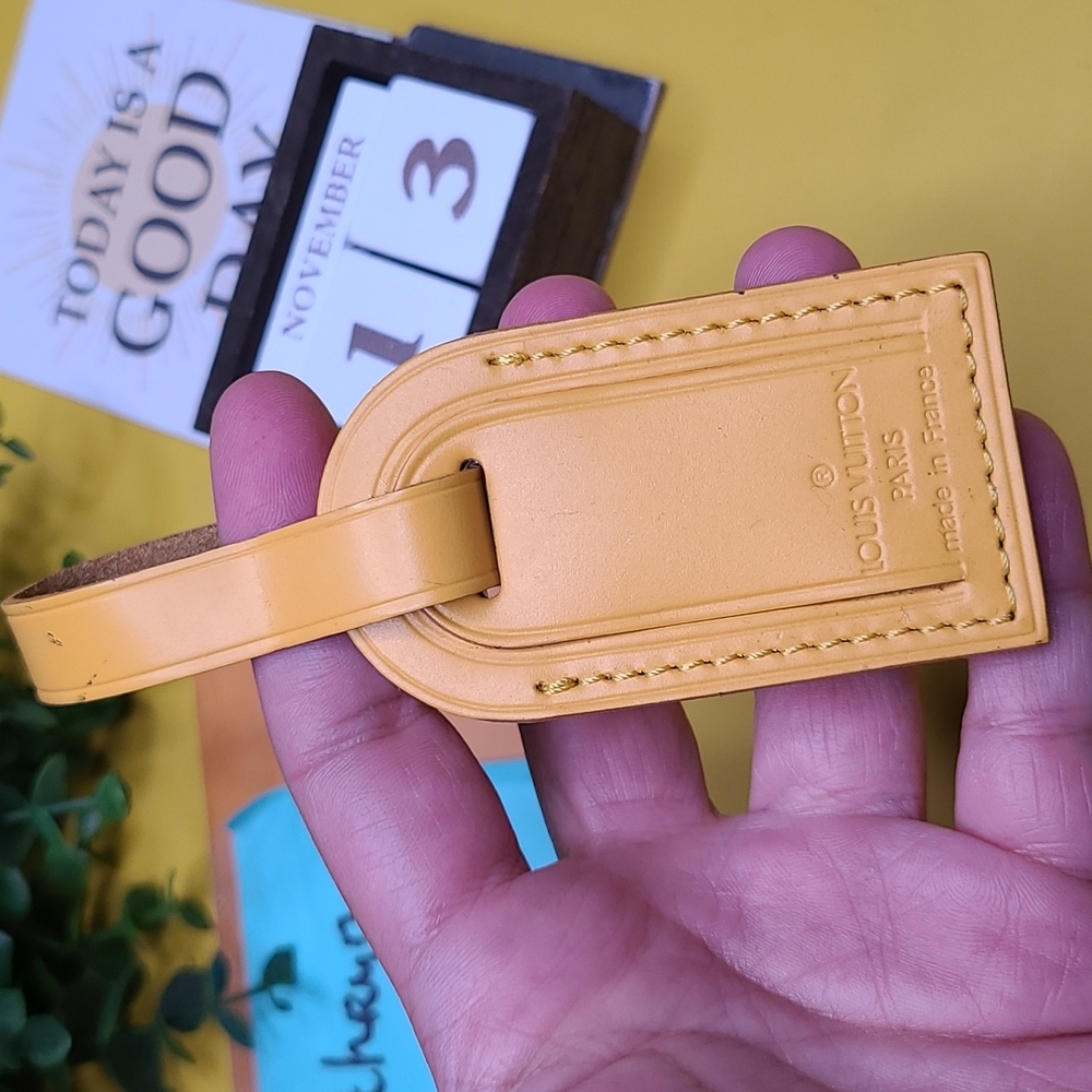 LOUIS VUITTON SMALL YELLOW LEATHER LUGGAGE TAG WITH GOLD HARDWARE